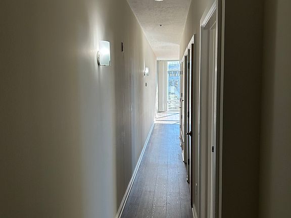 hallway when you enter: bedrooms are doors on right side of hallway