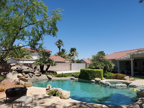 40' Lagoon Pebble Tec Pool & Spa with deck on both sides of the pool