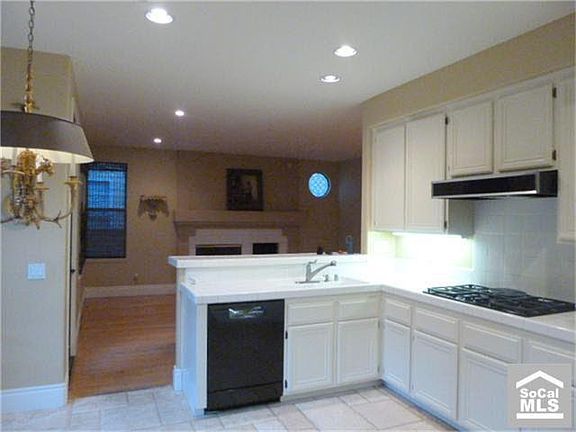 Old photo..kit has granite counters, new sink. Bronze faucets.