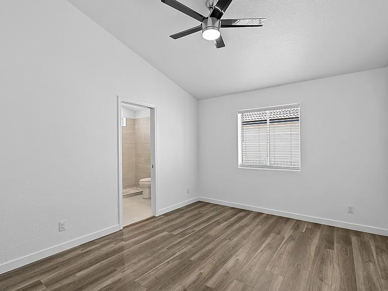 Master bedroom; window faces backyard and back house garage. Master bathroom w/master closet.