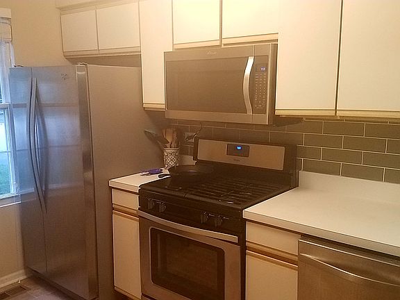 Stainless fridge, stove, microwave, dishwasher
