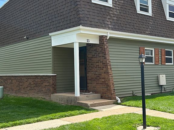 Front door to corner condo. 2 Reserved parking spots.