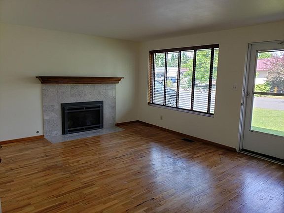 Living room with gas fireplace.