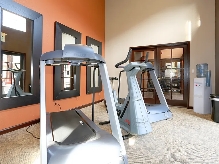 Break a sweat steps from home! Our community gym, located in the clubhouse, offers residents convenient access to fitness equipment for every workout style. Your wellness journey starts here!
