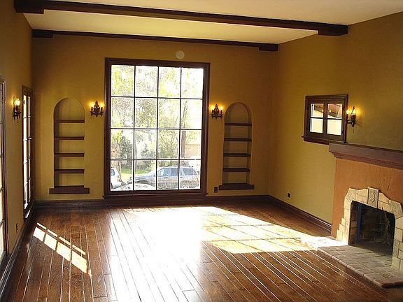 Beautiful Living Room w/ orignal floors and windows