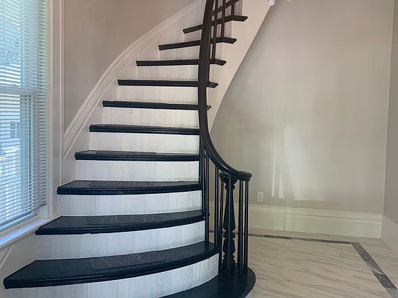 Foyer stairs to the main living area