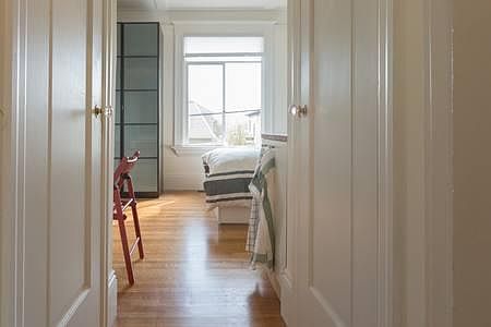 Opposite doors to bathroom and toilet