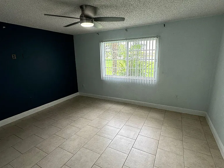 5005 Wiles Rd — Photo 10