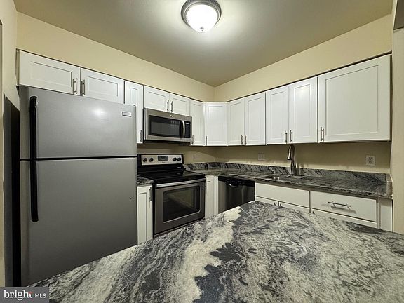 2nd image of 10127 Prince Pl Unit 303-11A