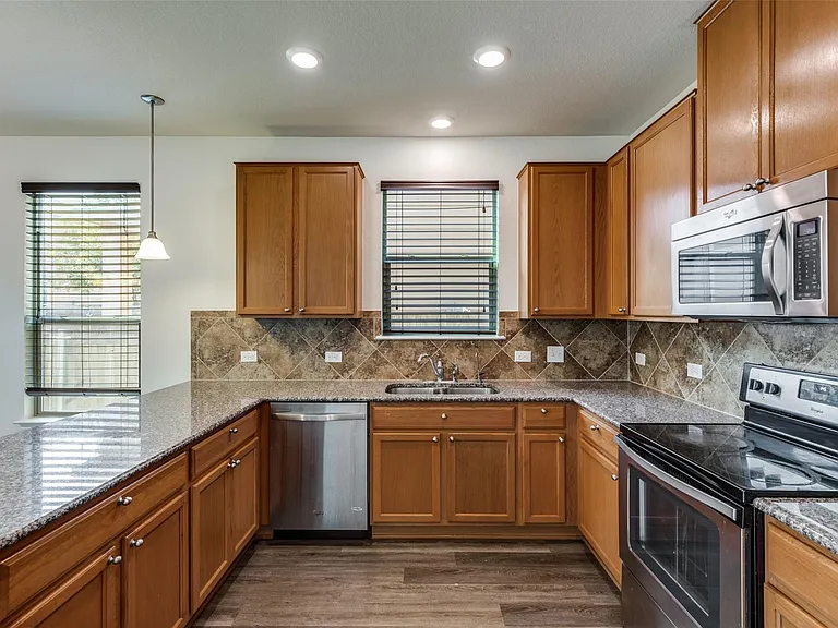 6209 Garden Rose Path — Photo 12