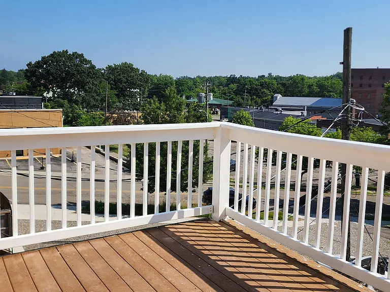 North View from the balcony deck, the white building is the Post Office.