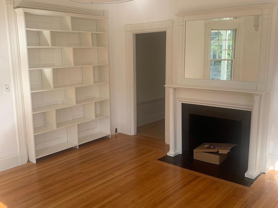 living room looking back toward doorway to kitchen (mirror over the mantle)