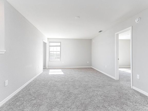 A large loft provides flexible-use space to suit your needs - New home in Winter Haven, FL