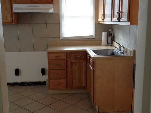 KITCHEN:VIEW FROM LIVING ROOM