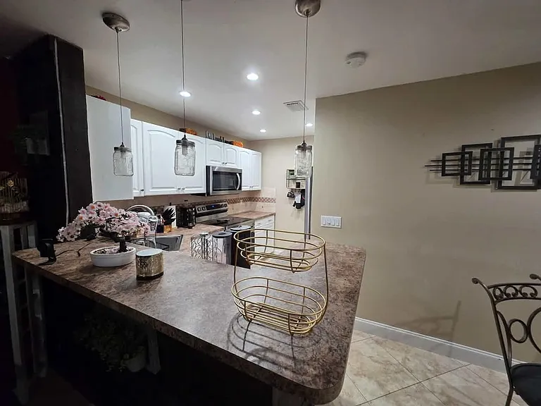 10046 Winding Lake Rd #202 — Photo 7