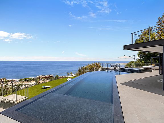 Relax in the curved infinity-edge pool overlooking the stunning Santa Monica Bay.