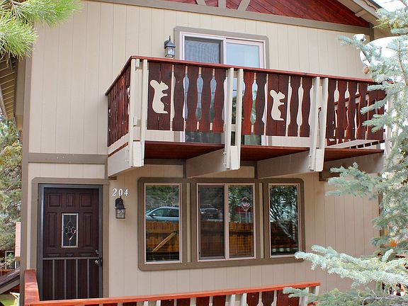 Front of house with balcony