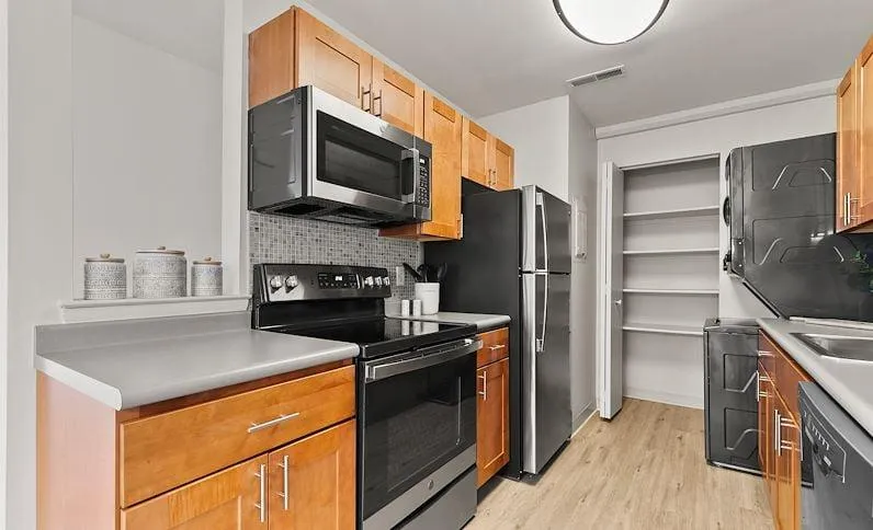 Contemporary Kitchen Style with Stainless Steel Appliances - East Mountain Apartments