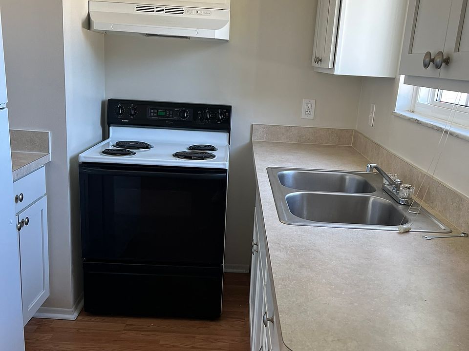 Quaint Kitchen with upper and power cabinets