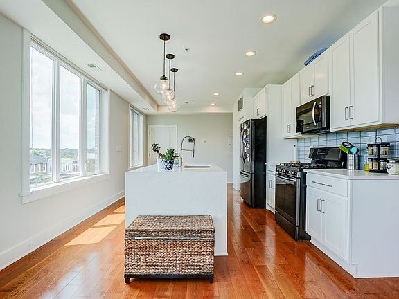Sun Drenched Kitchen, Living Room and Dining Area