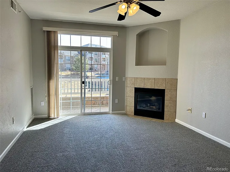 7440 S Blackhawk St #203 — Photo 1