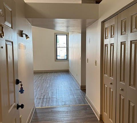 Entrance with lots of storage and light. Newer flooring throughout.