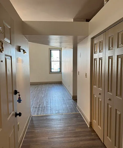 Entrance with lots of storage and light. Newer flooring throughout.