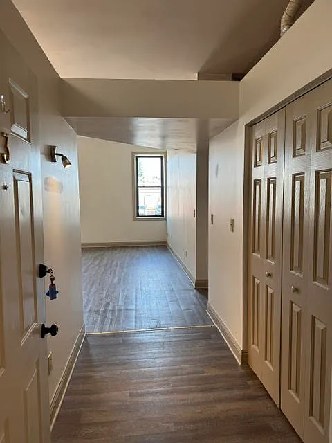 Entrance with lots of storage and light. Newer flooring throughout.