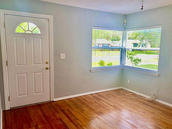 Main room with furniture. Furniture has been moved out. All wall, doors and trim painted in January 2021.