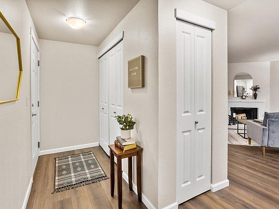 Foyer opens up into the main living areas with convenient coat closet.