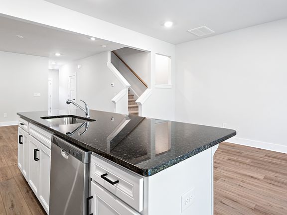 Kitchen with island in a DRB Homes Litchfield home in the Tyger Ridge Community