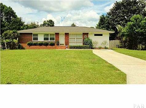 Front view of 3840 Whispering Pines. A charming home with great curb appeal.