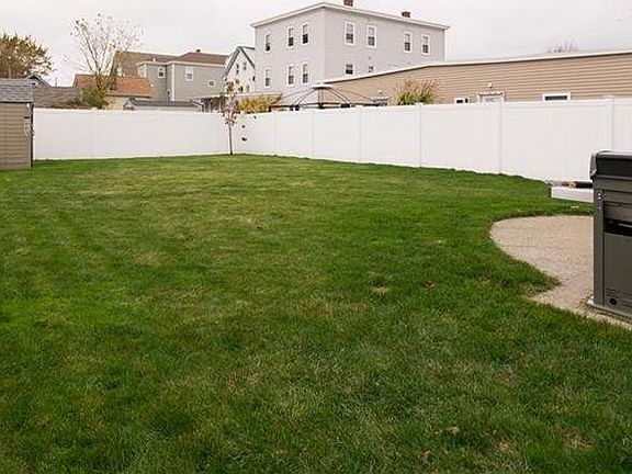 Large back yard with shed for storage