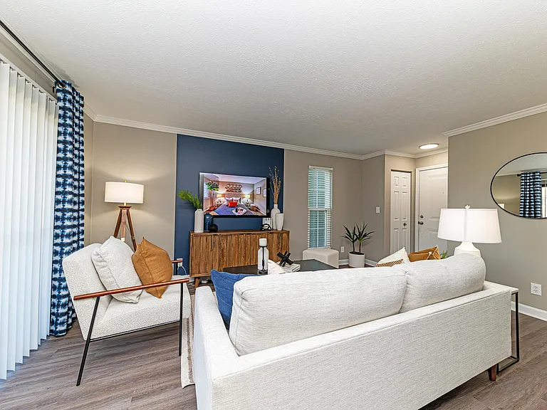 Spacious living room with hardwood-style flooring