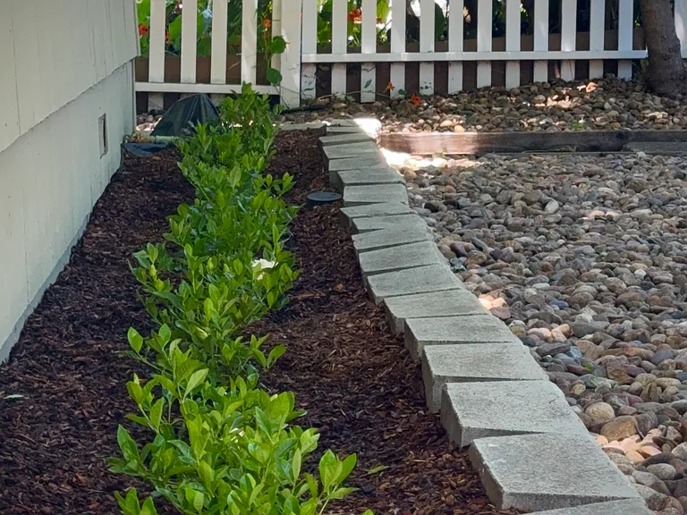 The property greets visitors with the scent of freshly planted gardenias.