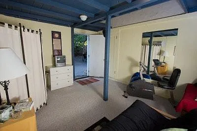 Garage has been converted to a laundry room with ample storage. An addition was added to the back of the garage and can be used for an office, gym, or guest bedroom.