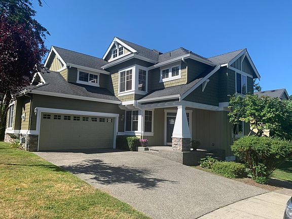 Newly painted, freshly cleaned gutters, roof, and yard.
