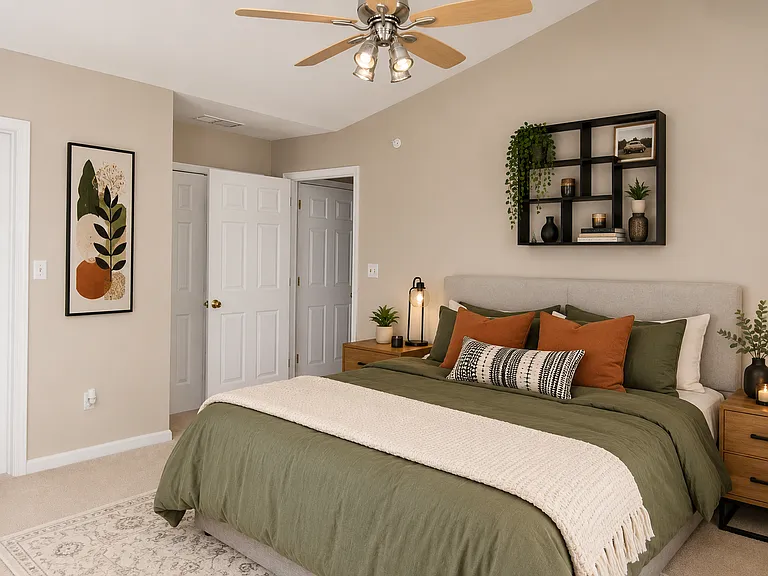 main bedroom with cathedral ceiling and huge walk in closet