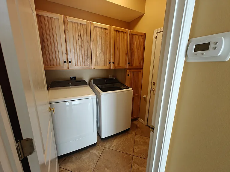 Laundry Room with Samsung Washer and Dryer