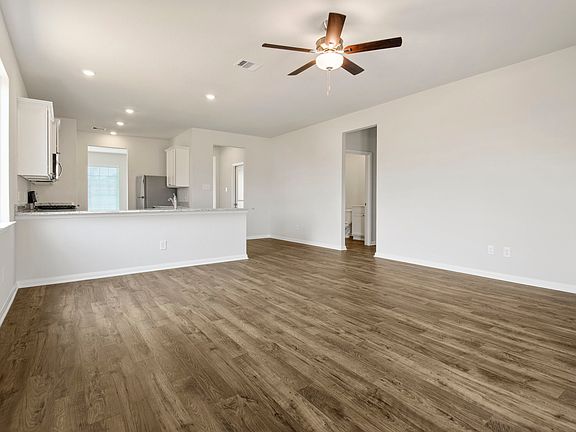 The open and spacious layout of this single-story home invites you to relax and unwind.