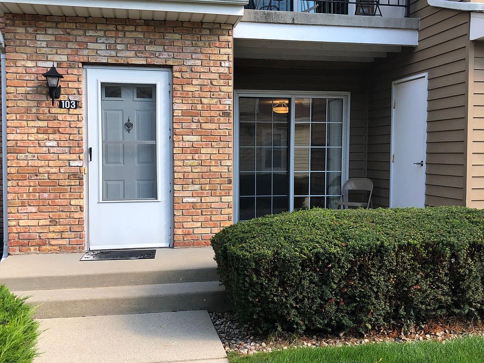 Front Door, patio is seen on the right with locked storage closet