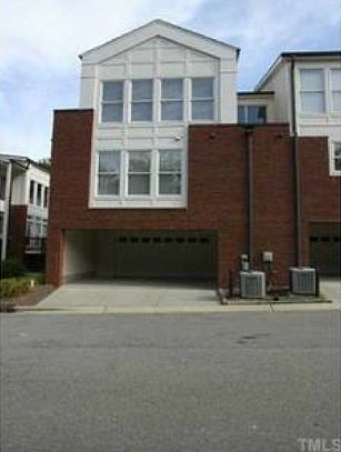 Back view, 2 car garage with carport