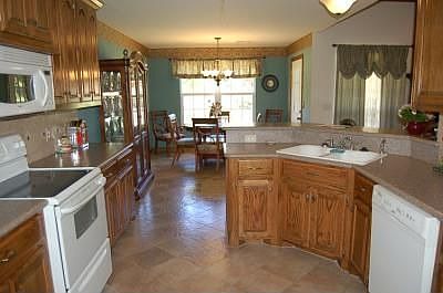 Spacious Kitchen with Oak Cabinets