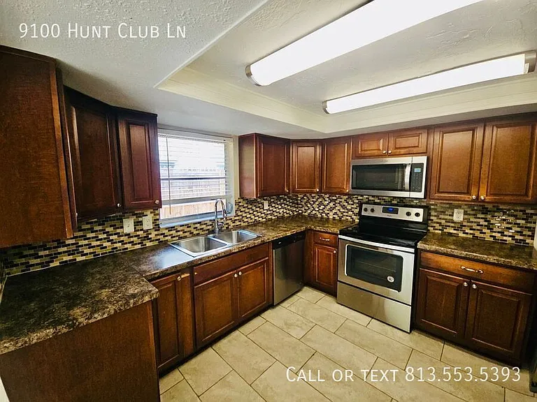 9100 Hunt Club Ln — Photo 18