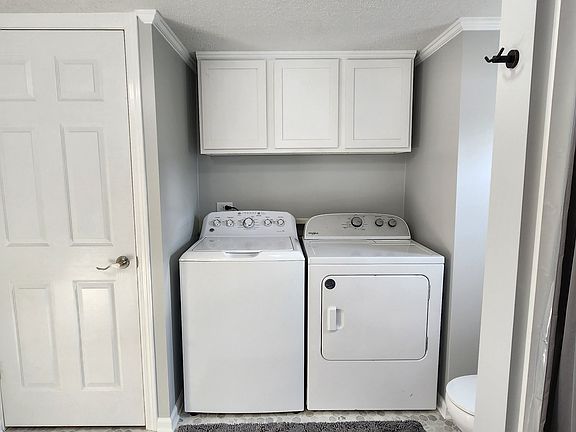 Washer & Dryer with overhead storage and storage closet