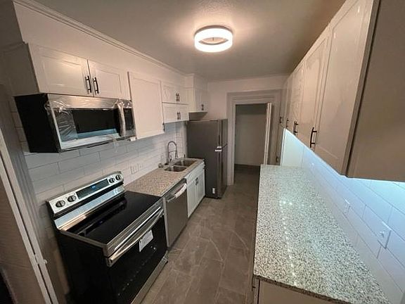 New Kitchen, New Appliances, New Floors and Countertops, New Cabinets