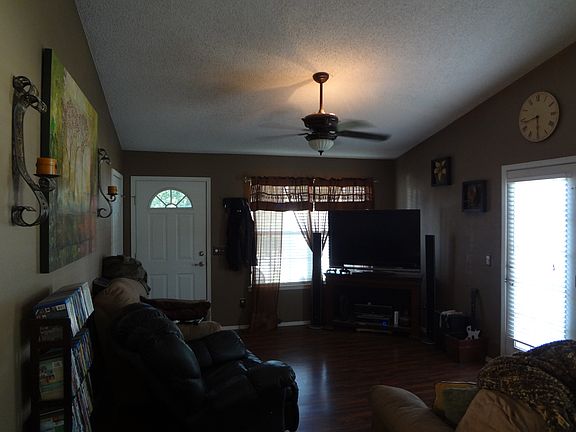 Living room w/ vaulted 
