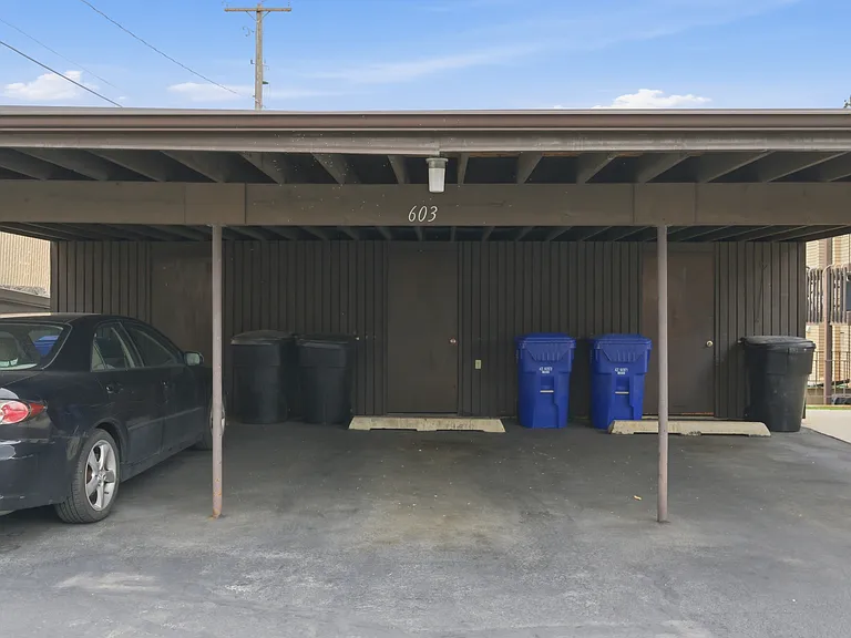 One covered parking and storage shed per unit