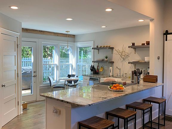 Open floor plan w hardwoods throughout the home