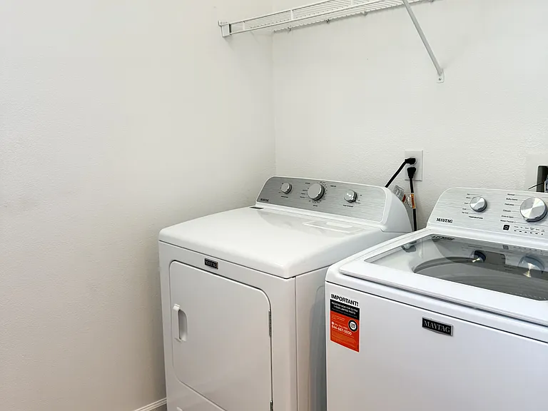 Brand new washer and dryer in the laundry room